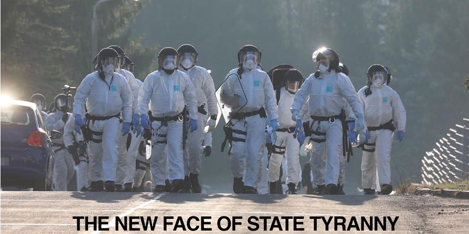 The new face of state tyranny - coronavirus police on the street with masks batons and shields