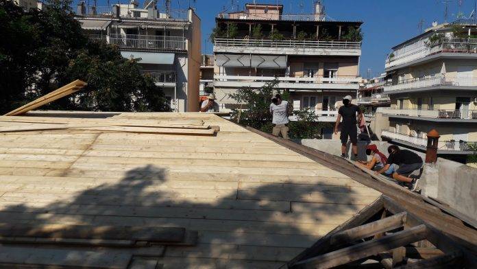 Roof of Libertatia Squat Athens subjected to a Police Raid in August 2020-696x392